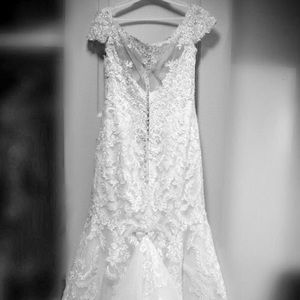 Absolutely stunning off the shoulder wedding dress